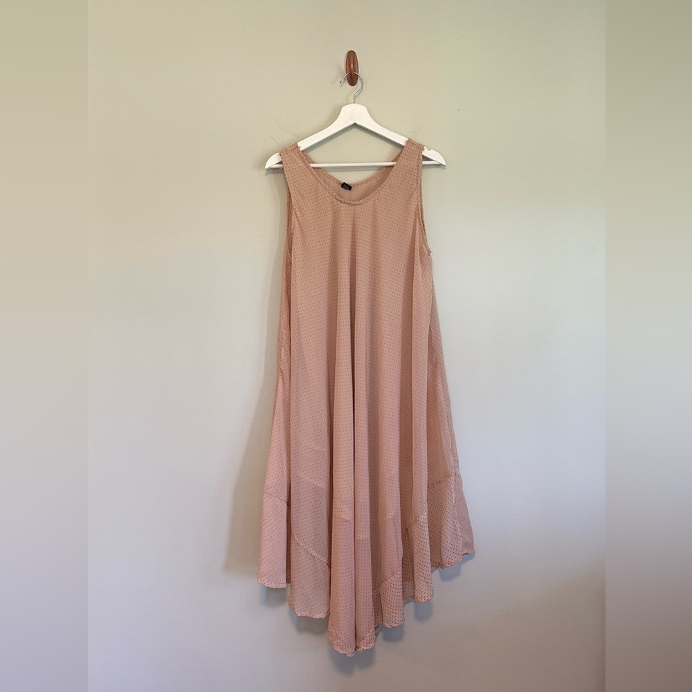 Flowy short sleeved pink dress with black polka dots